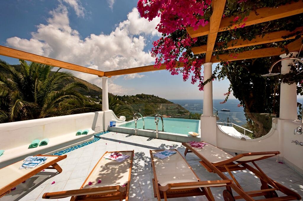 First floor pool with terrace and sea view